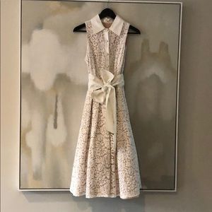 White and flesh tone Sleeveless dress.